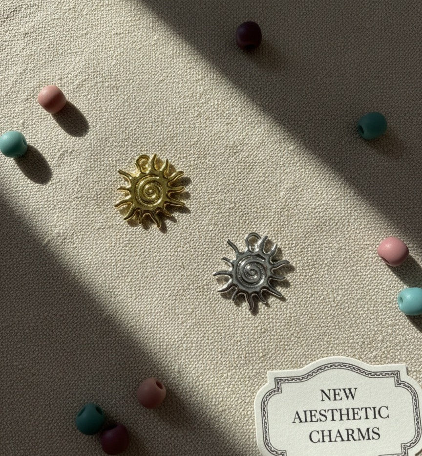 Sparkling Spiral Sun Charms – Gold & Silver Options HCM157