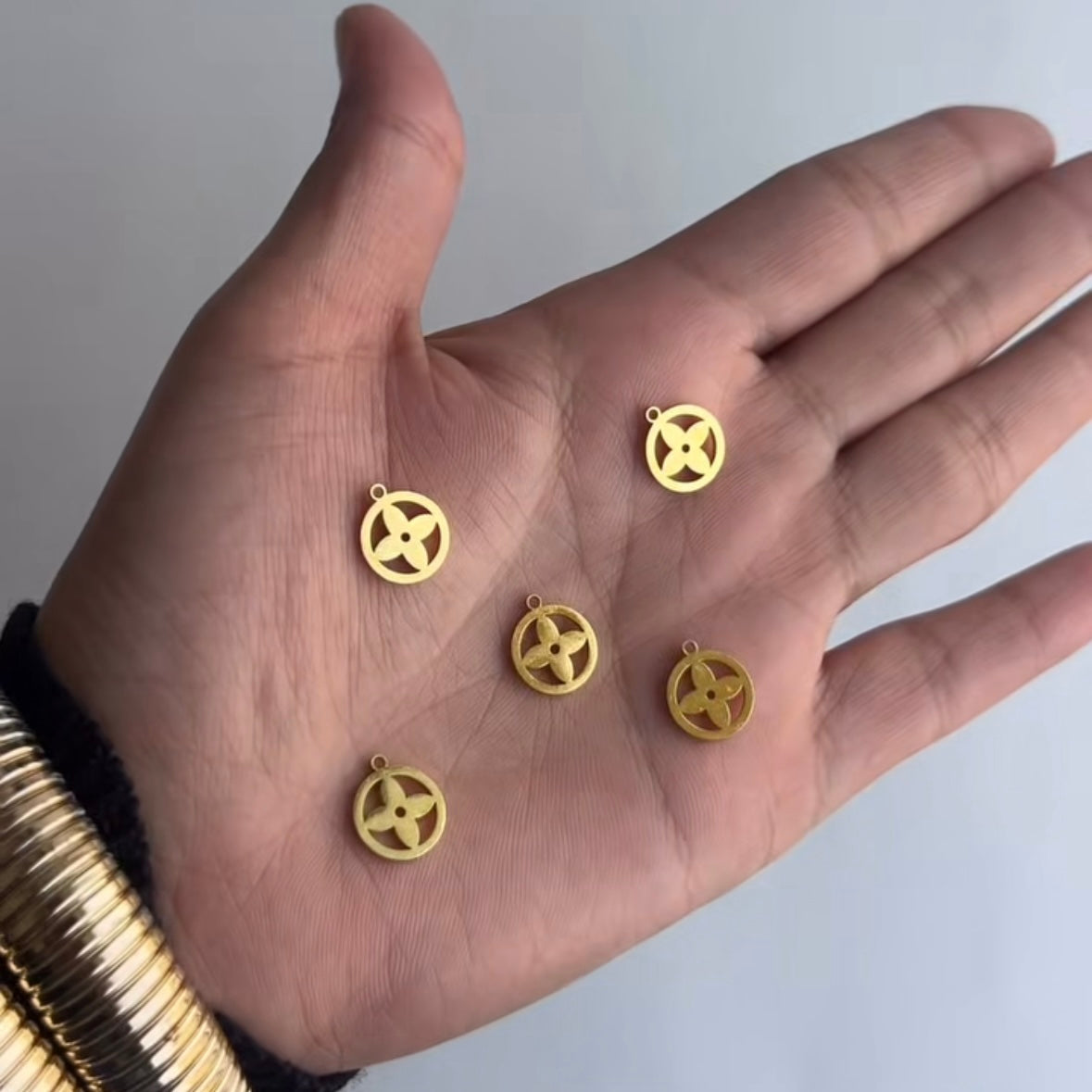 LV Wheel Charms ā Gold & Silver Stainless Steel