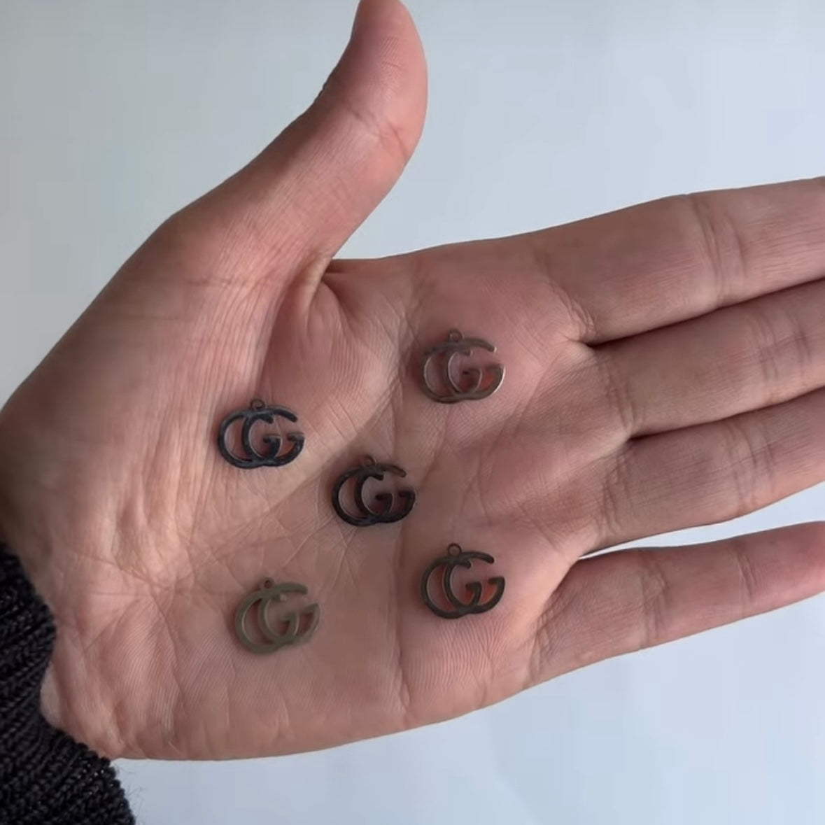 GG Interlocking Charms – Gold & Silver Stainless Steel