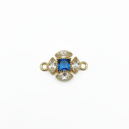 Akash Art Jewellers gold-tone connector charm with blue square crystal and clear marquise crystals.