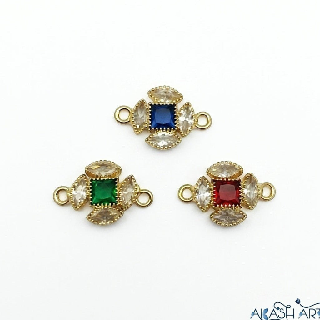 Akash Art Jewellers gold-tone alloy connector charms with blue, green, or red square crystals and clear marquise crystals.