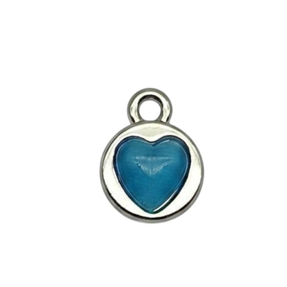 Akash Art Jewellers heart-shaped gemstone pendant necklace in green, blue, white, and pink. Polished silver-tone bezel.