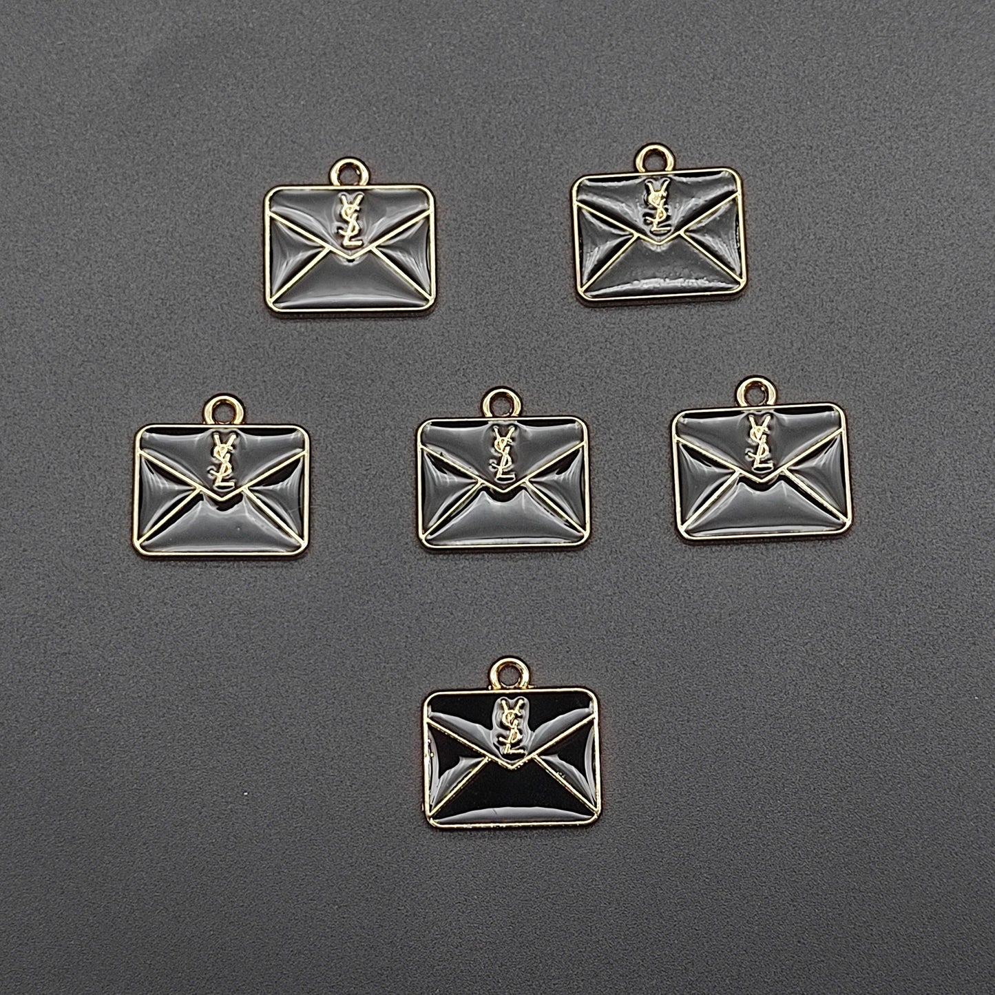 YSL charms