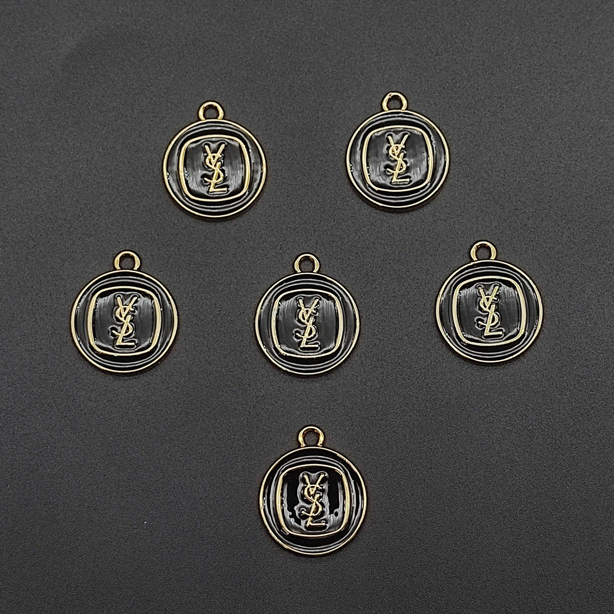 YSL charms
