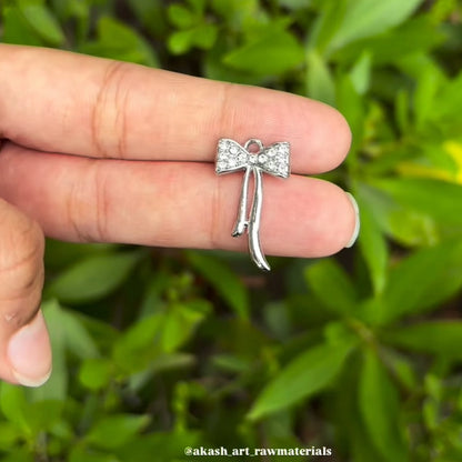 Silver bow charms